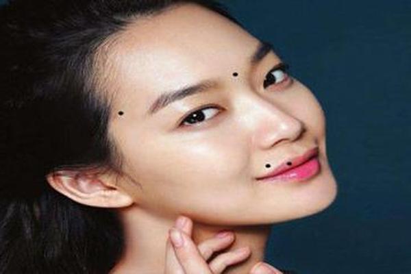 看麻衣相殿部长痣(光殿有痣代表什么图解)